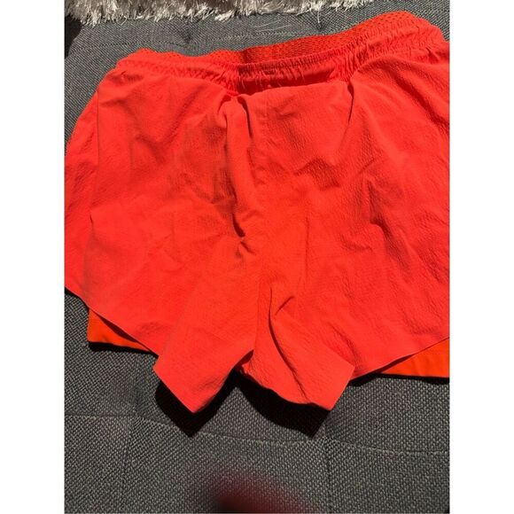 Athleta Trekkie Crest 2 in 1 shortie size 8 orange racing red - Picture 5 of 6